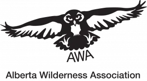 logo of Alberta Wilderness Association with a black and white owl with wings outstretched above AWA and org name